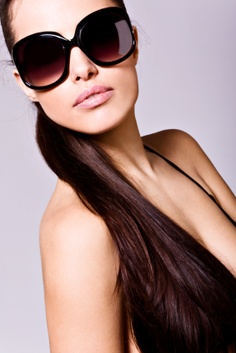 brunette portrait with sunglasses